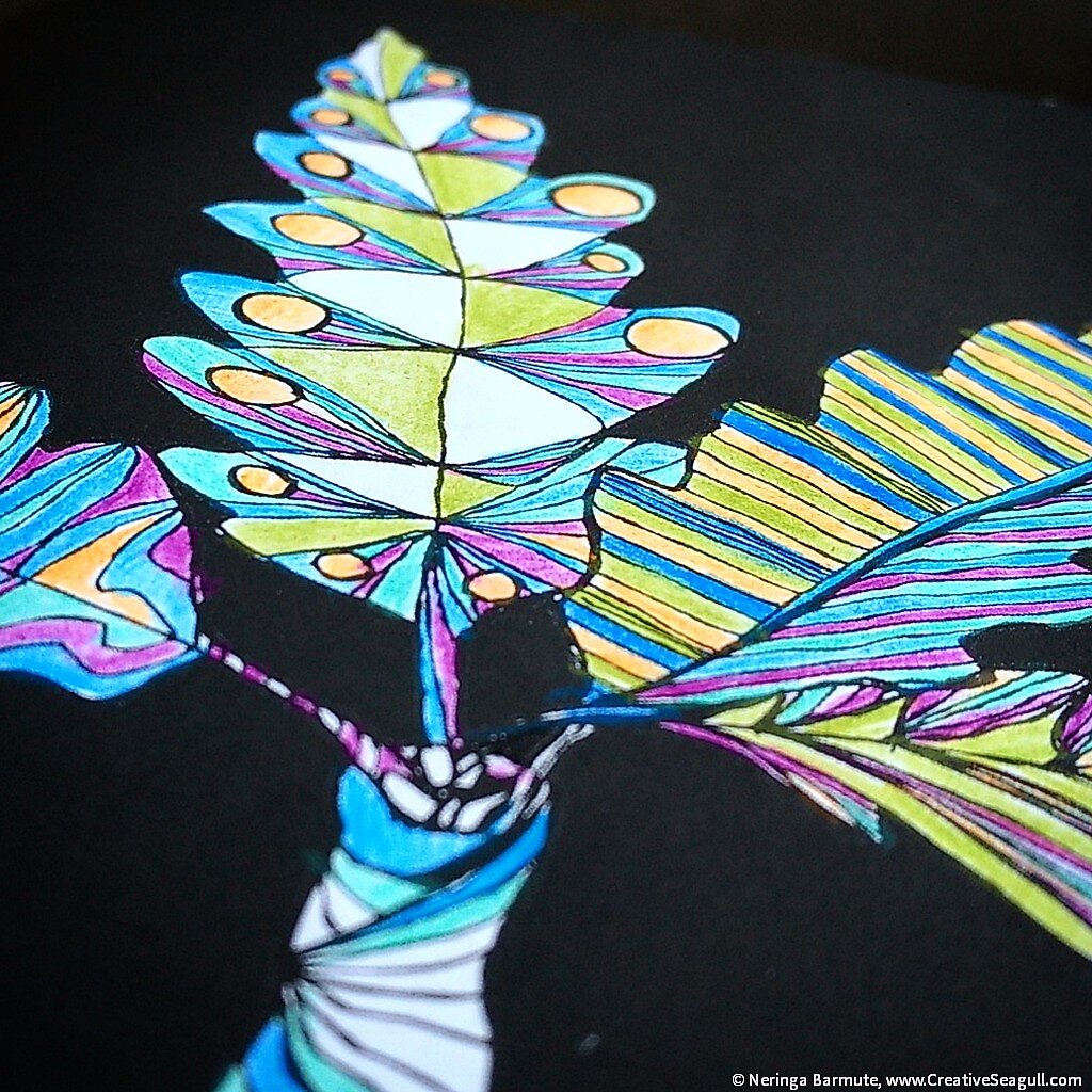 Calm colors fill this page from The Amazing BLACK World of Leaves