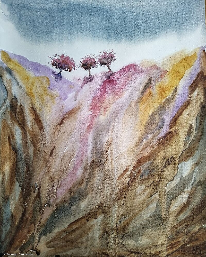 Three apple trees on a cliff